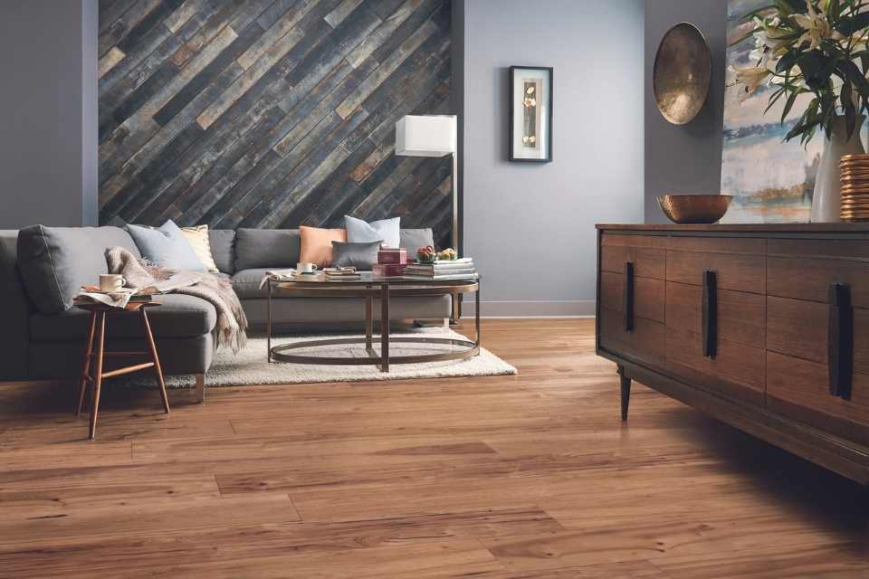 honey-hued hardwood flooring in rustic modern living room